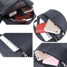 Sac compact et léger pour homme avec rangements sécurisés et design moderne.