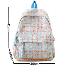 Sac à dos moderne avec rangement organisé, conçu pour les besoins quotidiens.