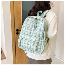 Sac à dos moderne avec rangement organisé, conçu pour les besoins quotidiens.