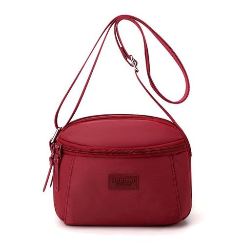 Sac à main compact et pratique avec poche zippée, parfait pour vos sorties.