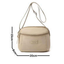 Sac à main compact et pratique avec poche zippée, parfait pour vos sorties.