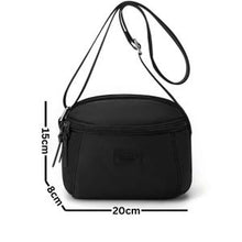 Sac à main compact et pratique avec poche zippée, parfait pour vos sorties.