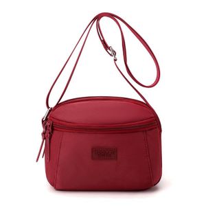 Sac à main compact et pratique avec poche zippée, parfait pour vos sorties.