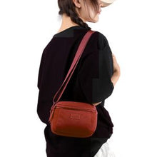 Sac à main compact et pratique avec poche zippée, parfait pour vos sorties.