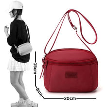 Sac à main compact et pratique avec poche zippée, parfait pour vos sorties.