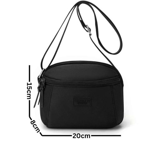 Sac à main compact et pratique avec poche zippée, parfait pour vos sorties.