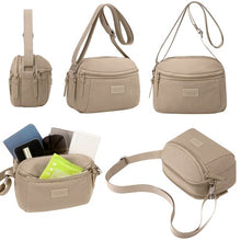 Sac à main compact et pratique avec poche zippée, parfait pour vos sorties.