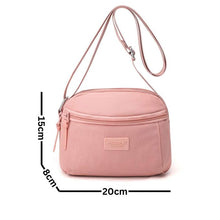 Sac à main compact et pratique avec poche zippée, parfait pour vos sorties.