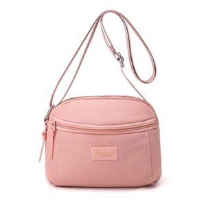 Sac à main compact et pratique avec poche zippée, parfait pour vos sorties.