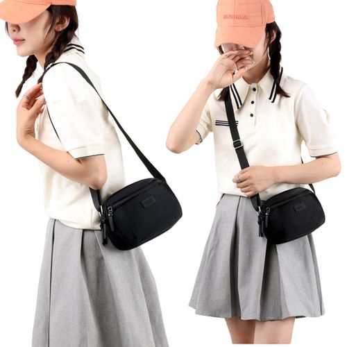 Sac à main compact et pratique avec poche zippée, parfait pour vos sorties.