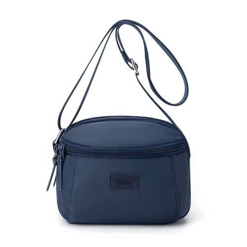 Sac à main compact et pratique avec poche zippée, parfait pour vos sorties.