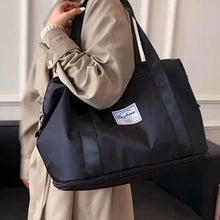 Sac de rangement pour vêtements de voyage pliable et léger de grande capacité