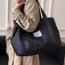Sac de rangement pour vêtements de voyage pliable et léger de grande capacité