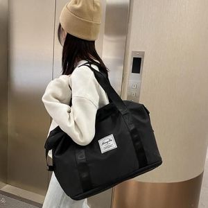 Sac de rangement pour vêtements de voyage pliable et léger de grande capacité